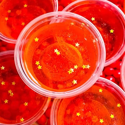 Close up of Fireball Jello Shots with gold star sprinkles