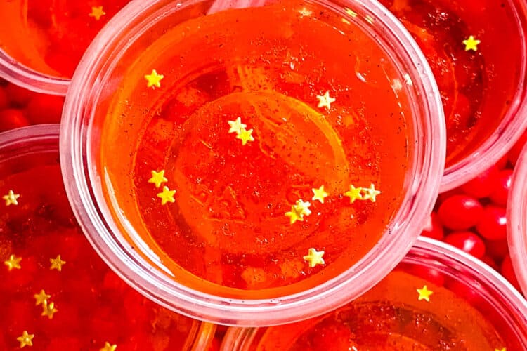 Close up of Fireball Jello Shots with gold star sprinkles