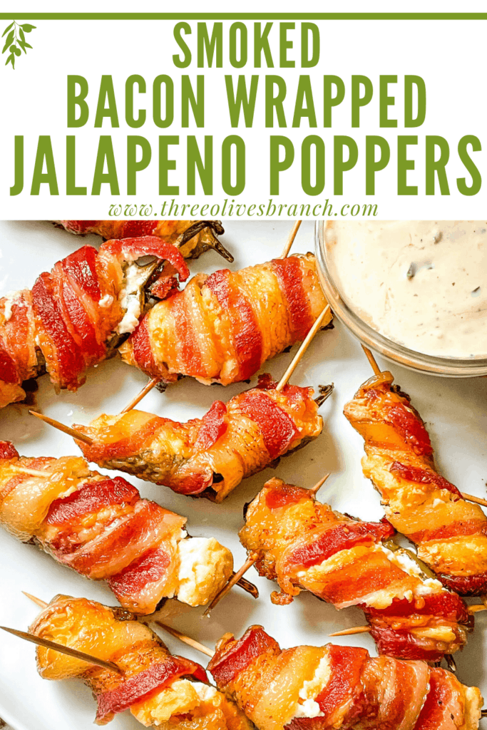 Pin image of Smoked Jalapeno Poppers on a white plate with title at top