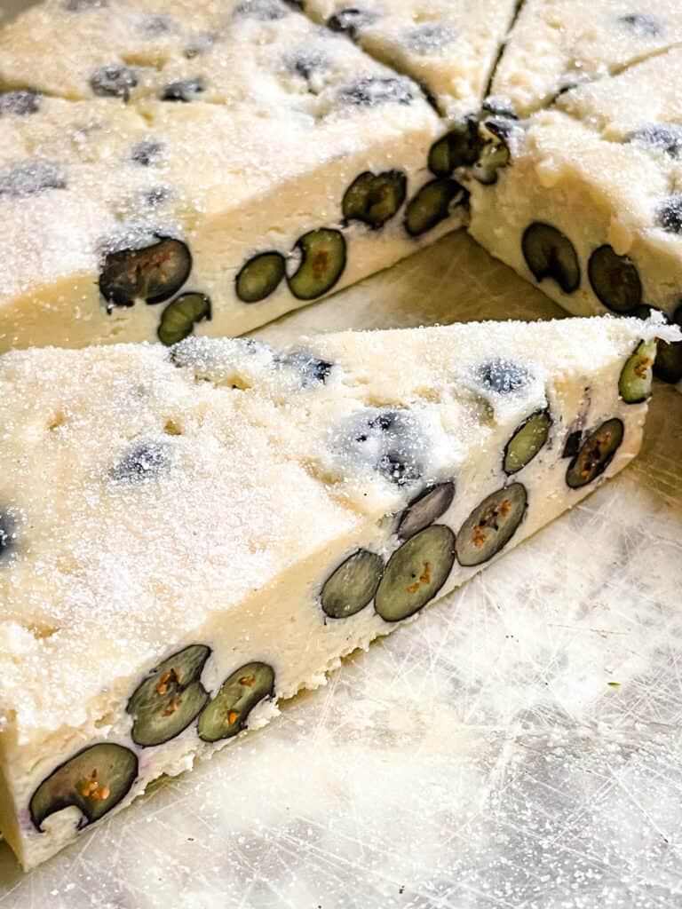 A wedge of raw scone dough after cutting