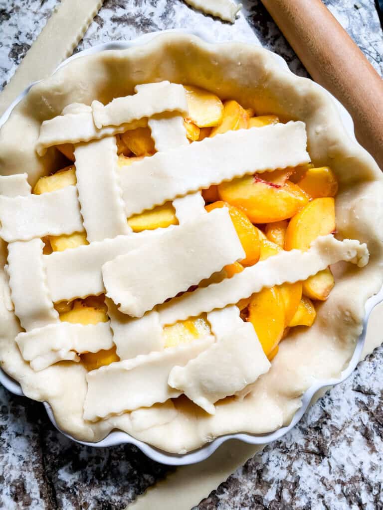 Lattice top being put on the pie