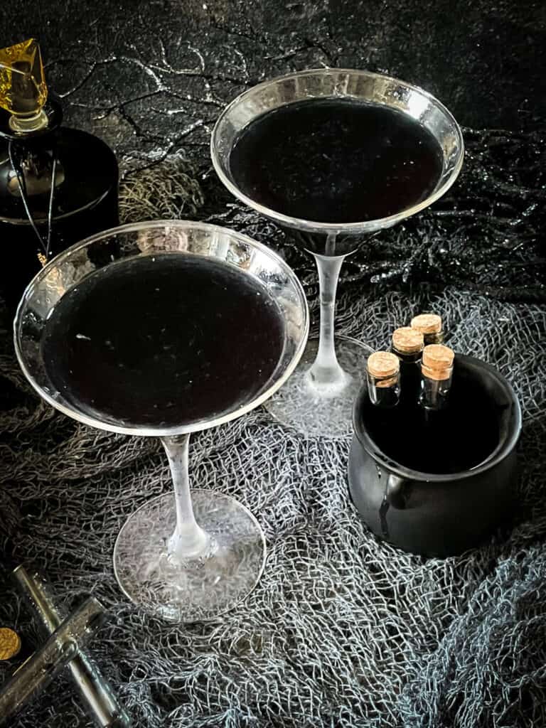 Two black Poison Apple Halloween Cocktails