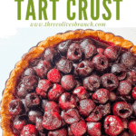 Pin image tp[ view of a cherry tart with title for Almond Tart Crust Recipe at top