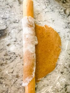 A rolling pin rolling up a Almond Tart Crust Recipe