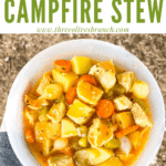 Pin image of a hand holding a bowl of Chicken Campfire Stew with title at top