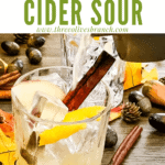 Pin image of Whiskey Cider Sour being poured with title at top