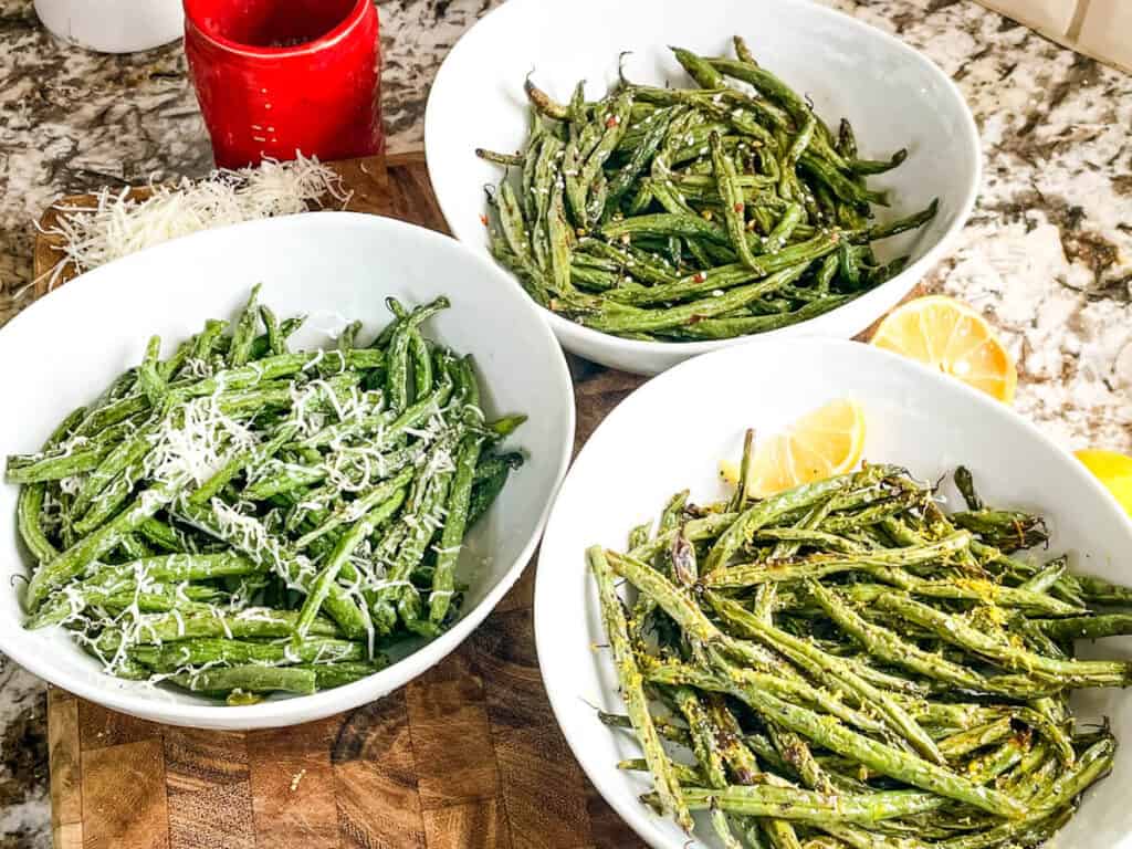 Air Fryer Green Beans (3 Ways) in three different white bowls