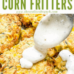 Pin image of White Gravy being poured on Corn and Zucchini Fritters with title at top