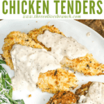 Pin image of Parmesan Air Fried Chicken Tenders on a white plate with white gravy and title at top