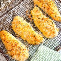 Parmesan Air Fried Chicken Tenders in an air fryer basket