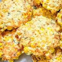 Closer top view of Corn and Zucchini Fritters in a pile