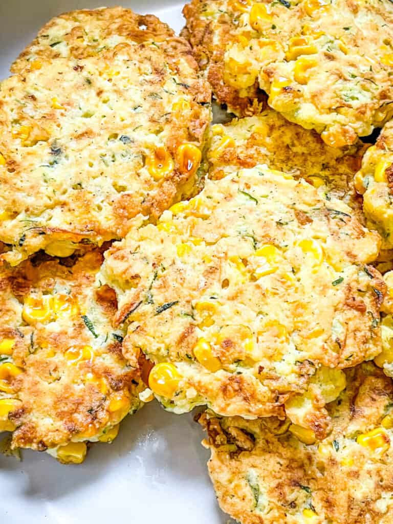 Closer top view of Corn and Zucchini Fritters in a pile