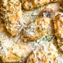 Parmesan Garlic Chicken Wings spread out on butcher paper