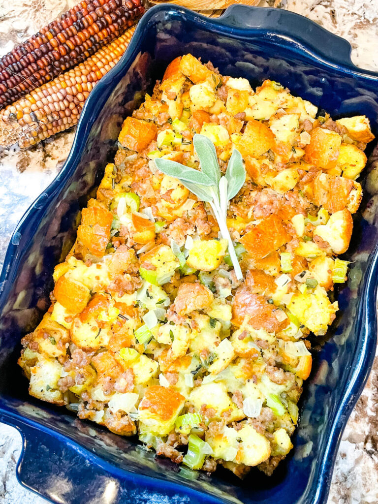 Top view of Sausage Stuffing in a dark blue dish