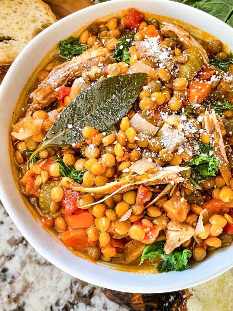 Close view of Turkey Lentil Soup in a white bowl