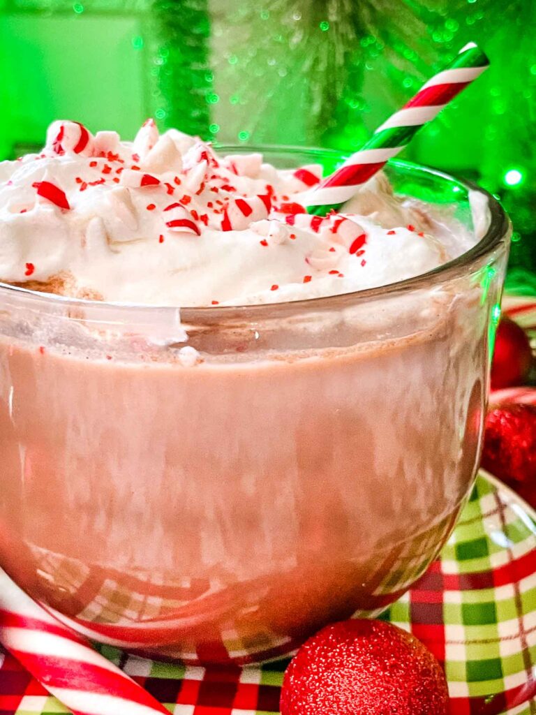 Close up of the side of Holly Jolly Christmas Cocktail in a clear mug