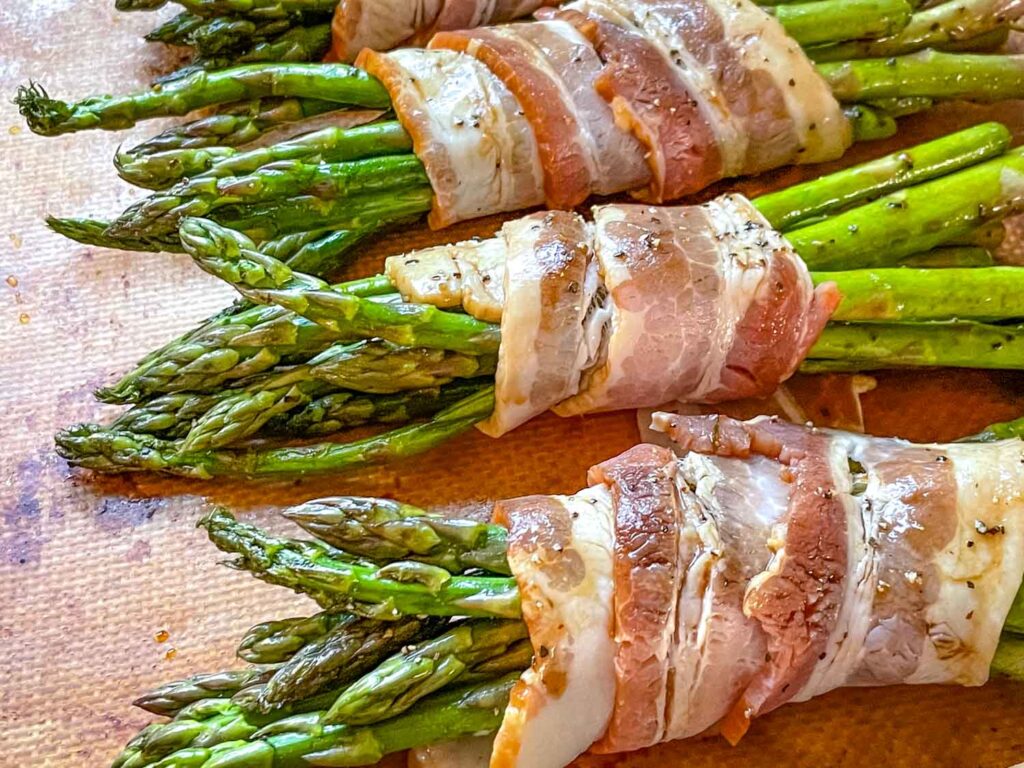 The bundles from the side view on a baking sheet