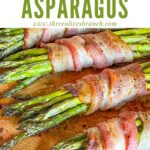 Pin of Asparagus Wrapped in Bacon lined up on a baking sheet with title at top