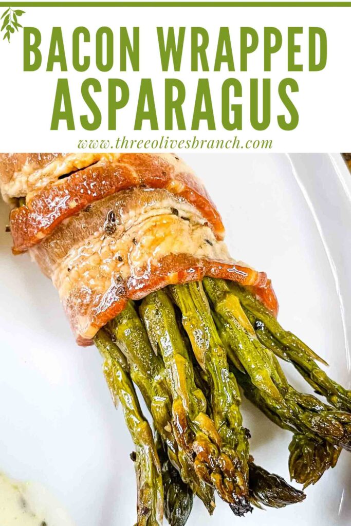 Pin of one Asparagus Wrapped in Bacon bundle on a white plate with title at top