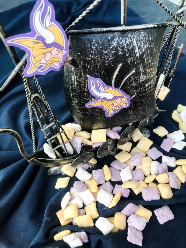 Minnesota Vikings Puppy Chow scattered around a metal ship