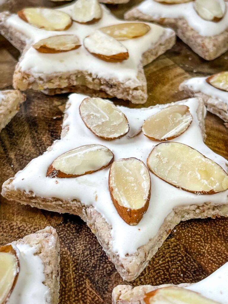 Close up of a cookie with the almond slices