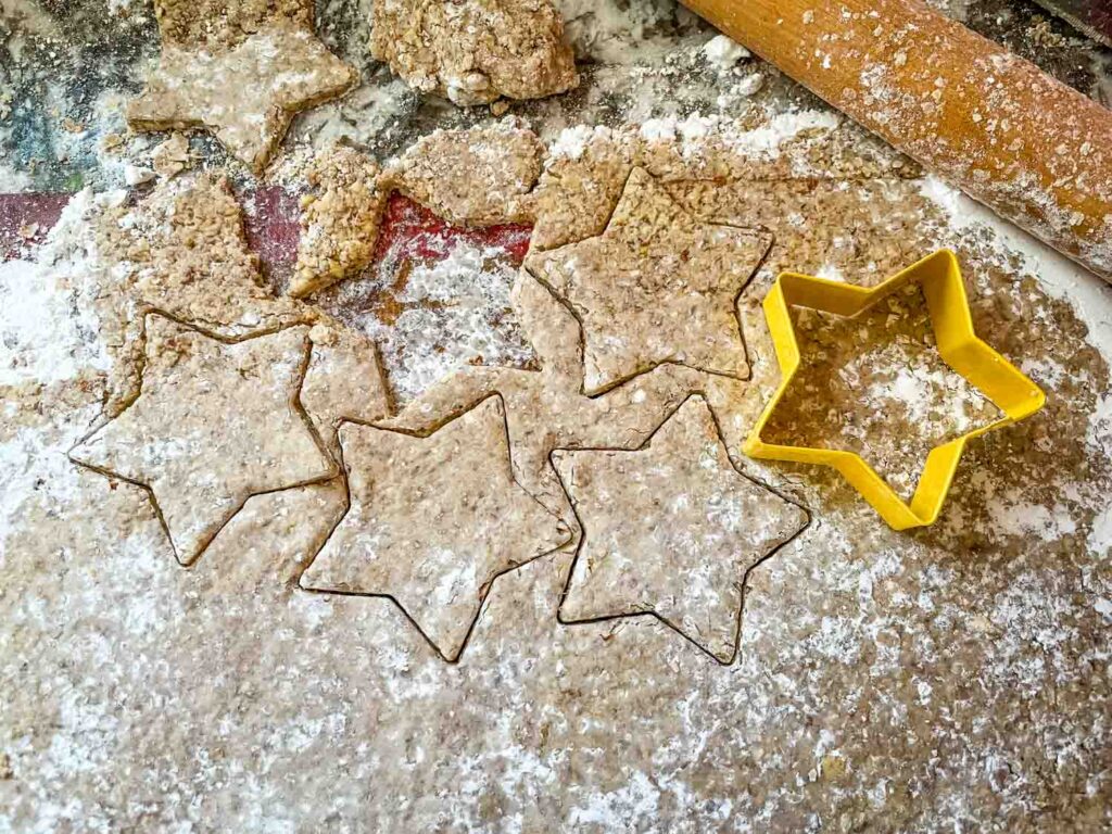 Cutting out the cookies from the dough