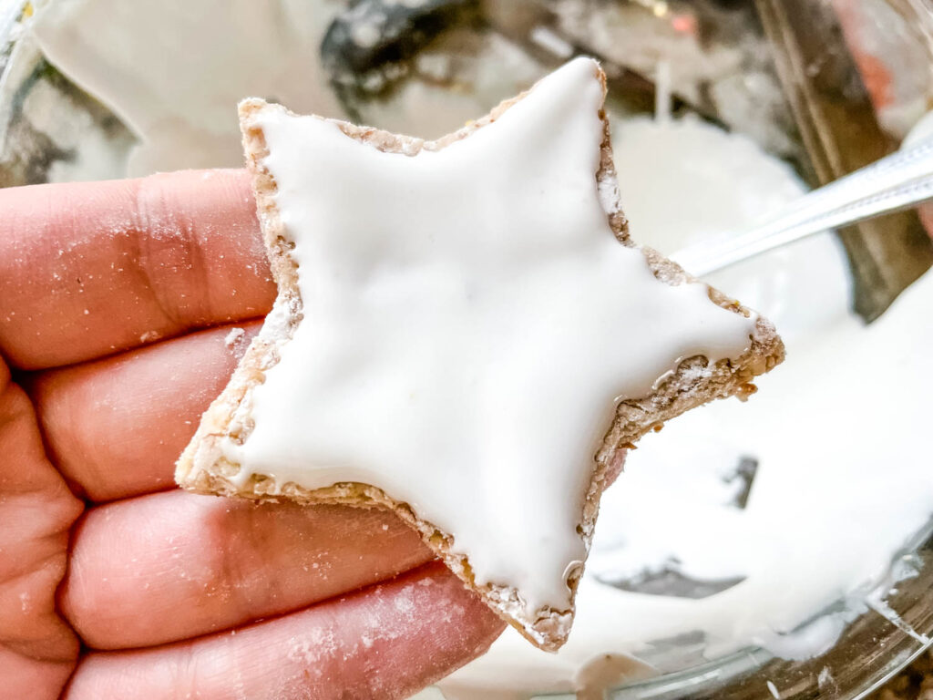 A cookie that has been frosted with meringue