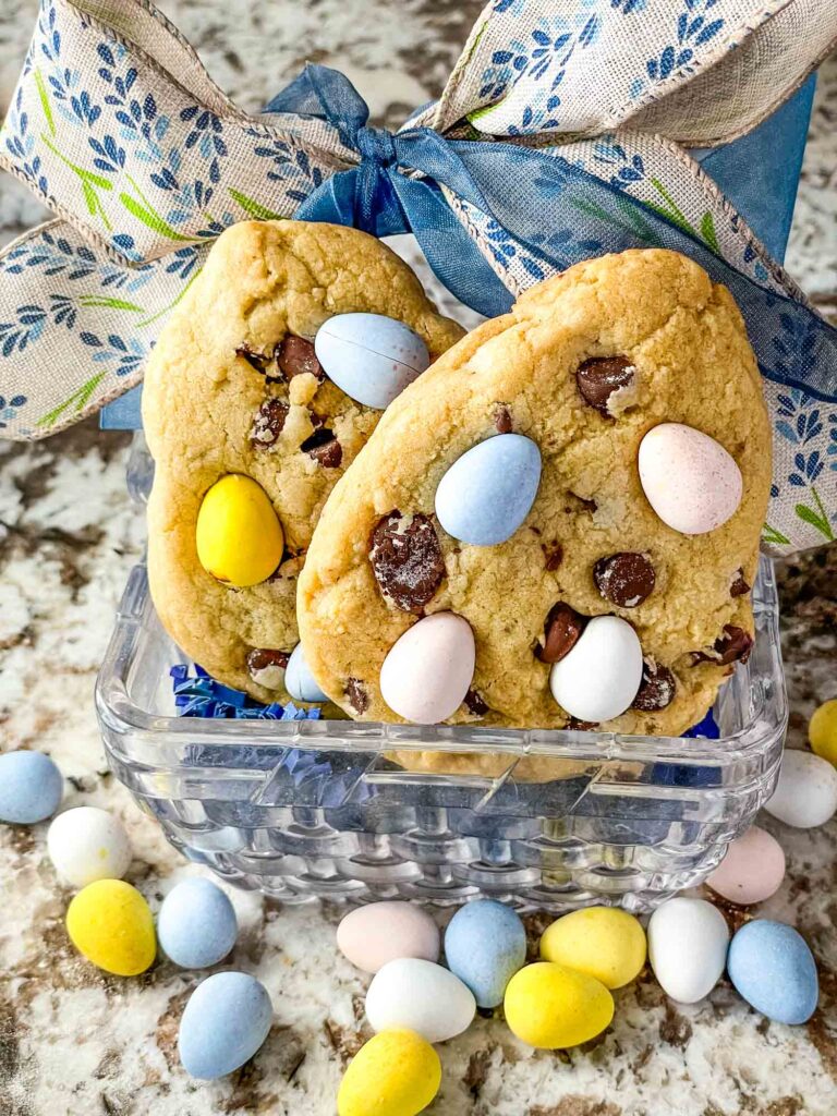 Two Mini Eggs Cookies in a glass easter basket