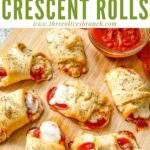 Pin of Pizza Crescent Rolls on a cutting board with title at top