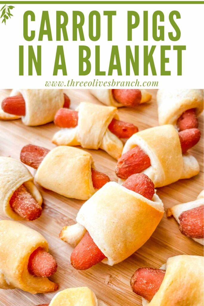 Pin of Vegan Carrot Pigs in a Blanket on a cutting board with title at top