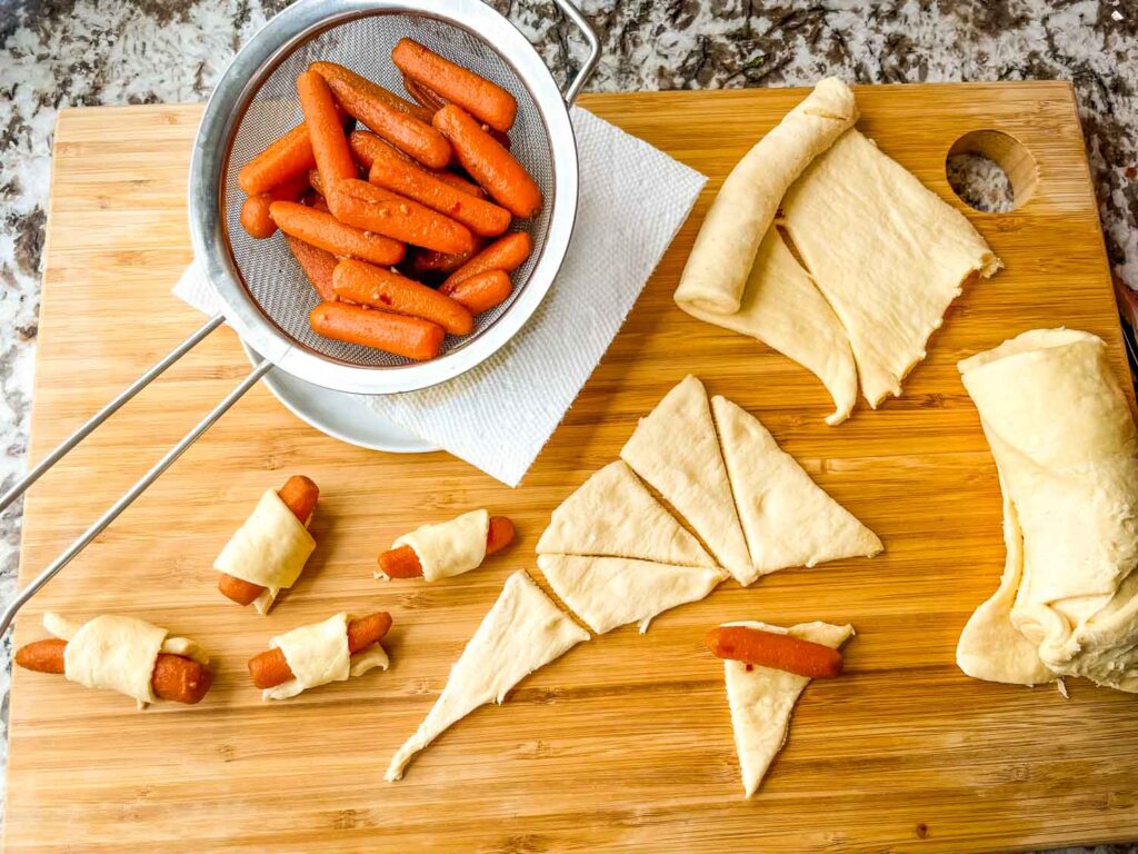 Vegan Carrot Pigs in a Blanket being assembled