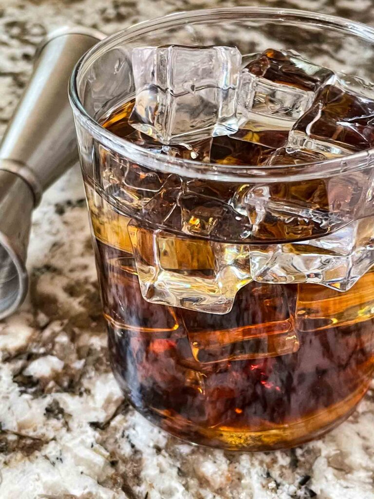 Close up of the drink in a glass with ice