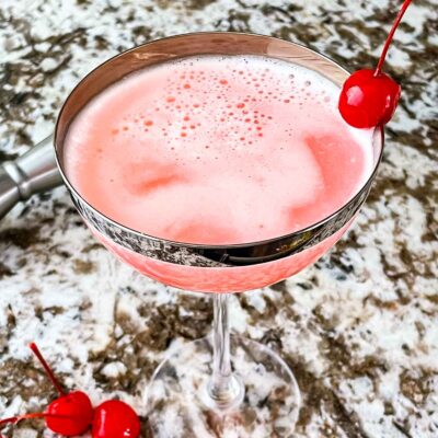 Pink Lady Cocktail in a coupe glass