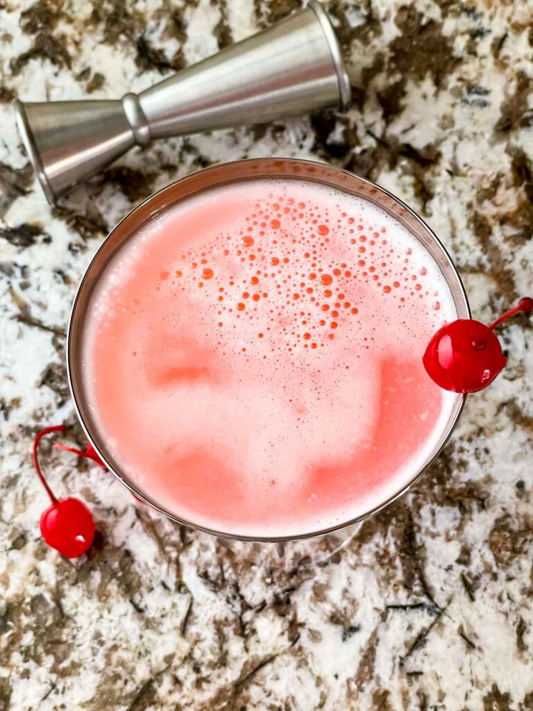 Top view of a Pink Lady Cocktail in a glass