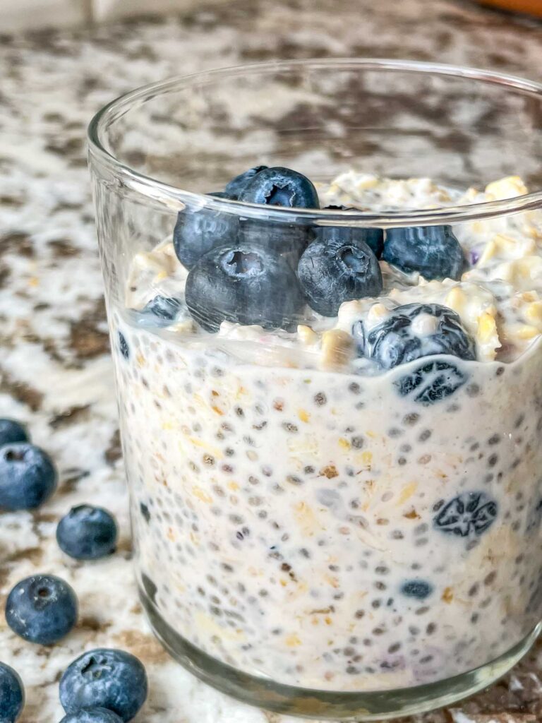 The side view of Blueberry Overnight Oats in a glass