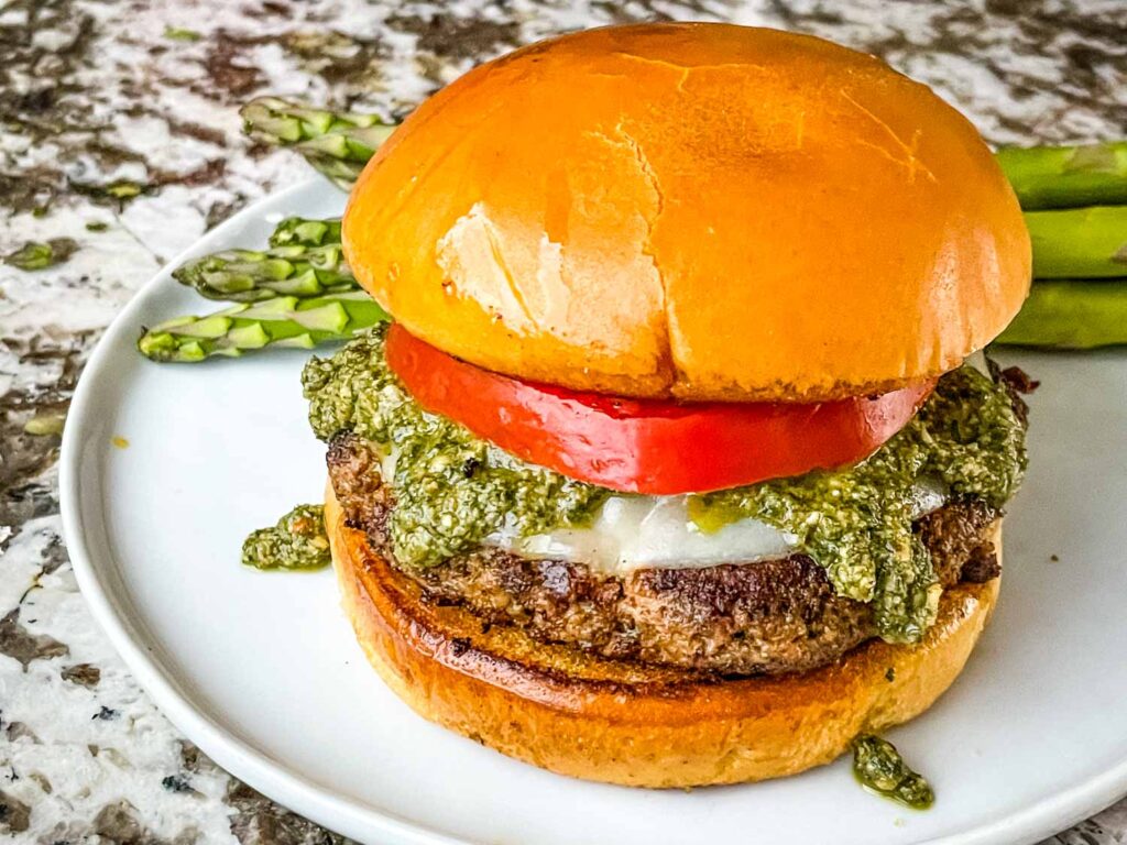 A Pesto Turkey Burger on a white plate