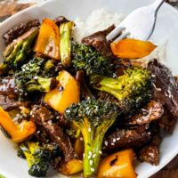 Teriyaki Beef Stir Fry in a bowl with a fork digging into it