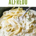 Pin of a fork twirling Alfredo Linguine with title at top