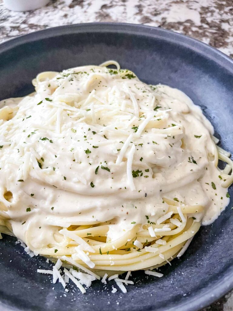 A pile of Alfredo Linguine in a bowl