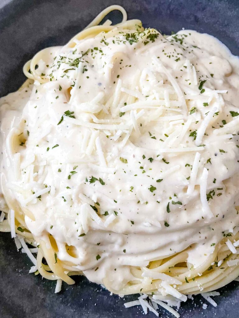 Top view of Alfredo Linguine in a black bowl