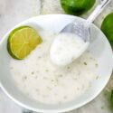 A spoon scooping Lime Glaze out of a white bowl