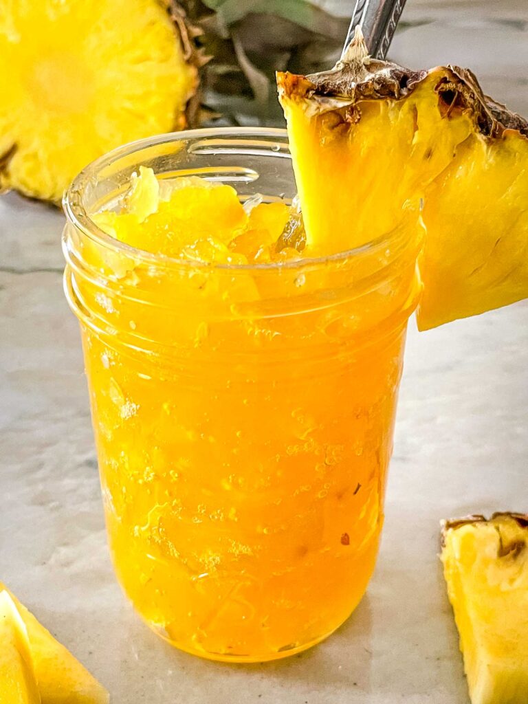 A clear jar full of Pineapple Jam