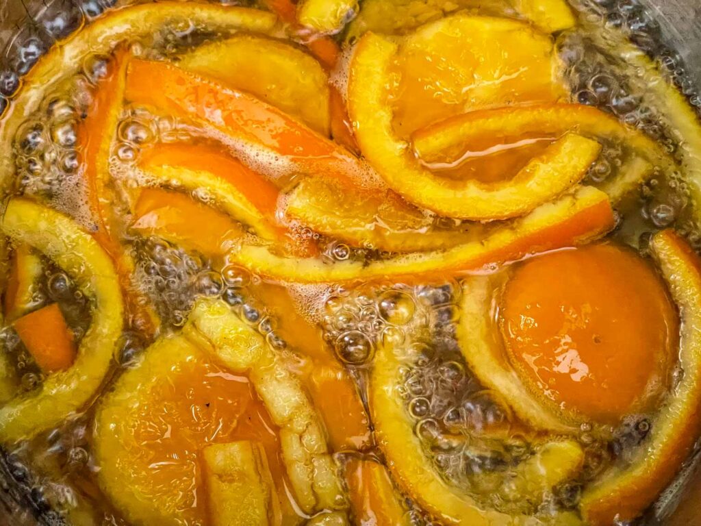 Oranges boiling in sugar water