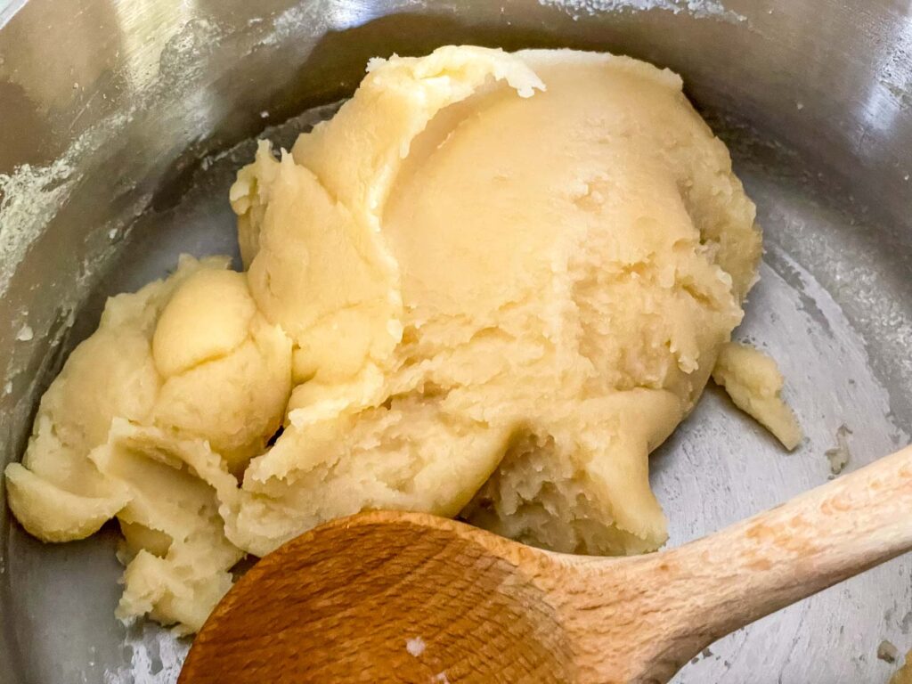 Cream puff dough after mixing in a pot