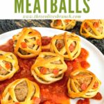 Pin of Halloween Mummy Meatballs on a bed of marinara on a plate with title at top