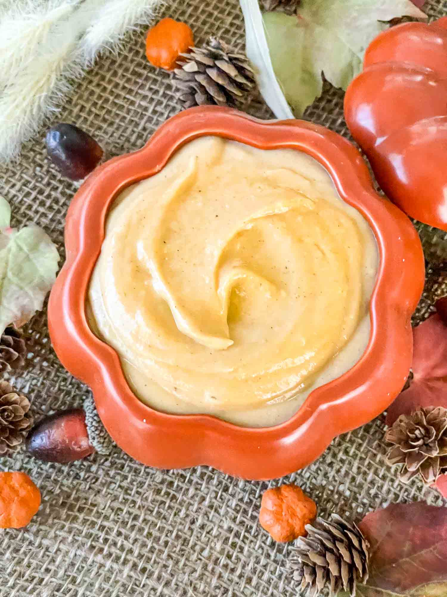 Top view of Pumpkin Pastry Cream in a pumpkin bowl