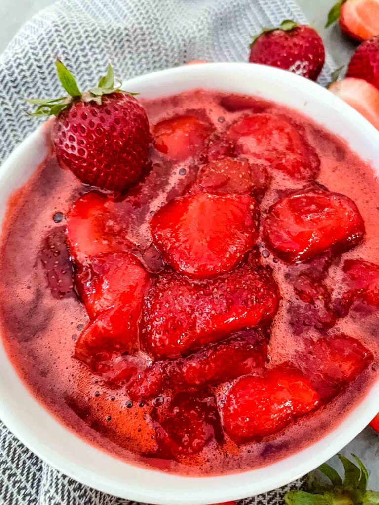 Close up of Strawberry Sauce from the top view in a white vowl