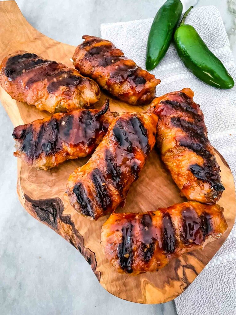 Armadillo Eggs on a cutting board