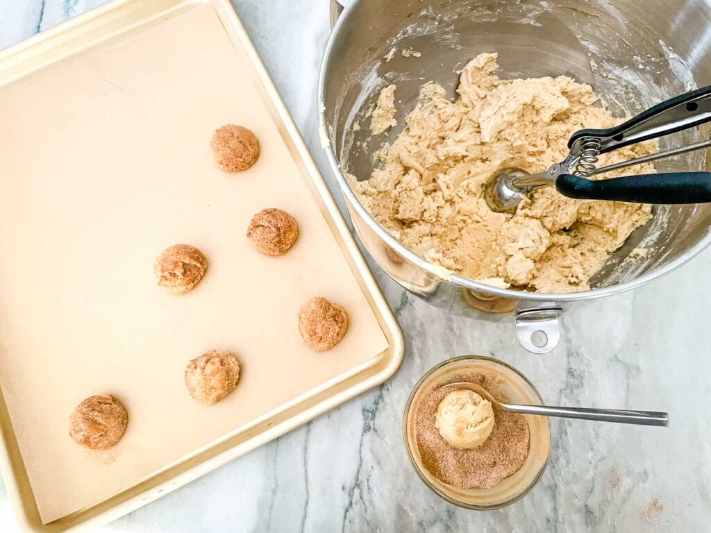 Portioning the dough and placing them on the baking sheet