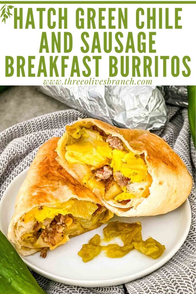 Pin of a Hatch Green Chile Sausage Breakfast Burrito cut in half on a plate with title at top